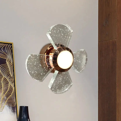 Modern copper starburst glass wall sconce with five glass blades and maximum bulb wattage of 60w for corridors