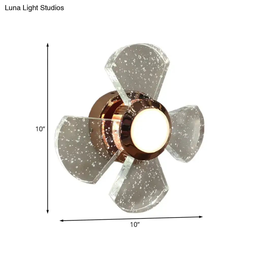 A modern 10-inch ceiling fan with copper motor housing and acrylic blades featuring speckles, emphasizing maximum bulb wattage