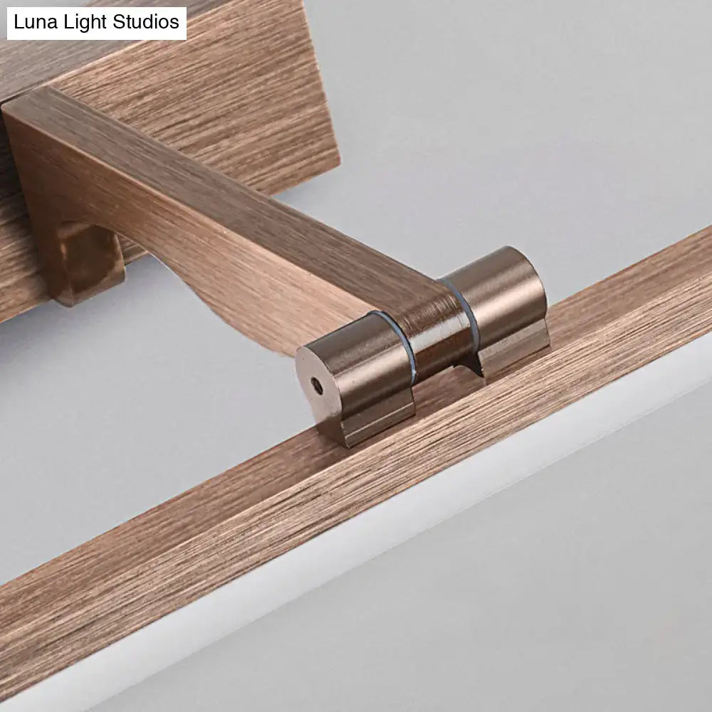 Bronze-finished metal hinge with sleek cylindrical design connecting wood grain panels for modern wall light fixture height