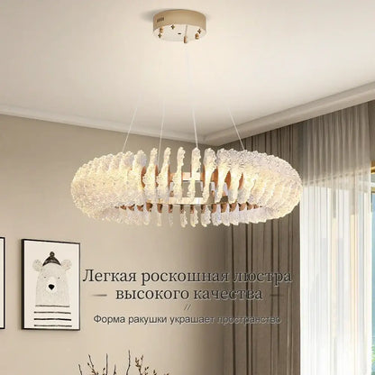 Modern coral flower crystal chandelier with textured translucent crystals and warm metal accents for dining room decorbites coral flower
