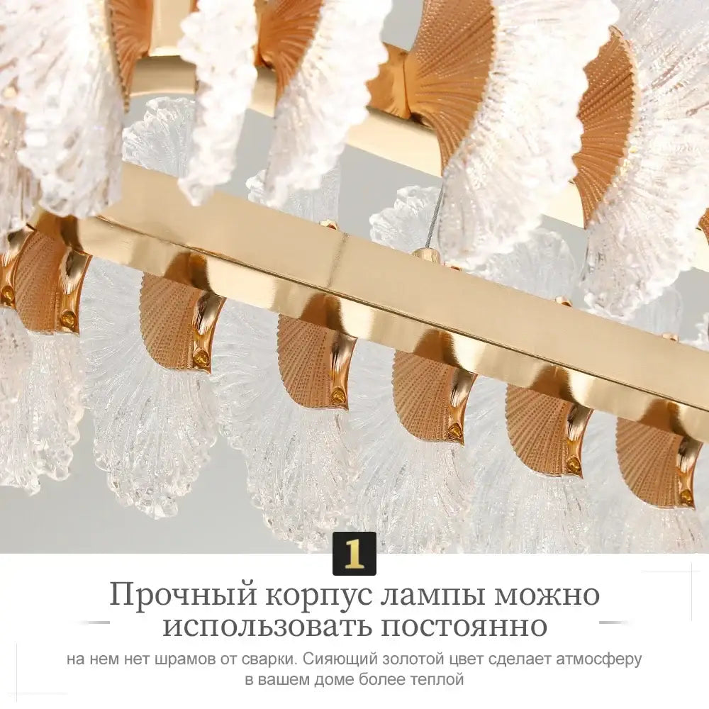 Modern coral flower crystal chandelier with gold-toned frame and clear fan-shaped glass shades for dining room decorbites coral flower