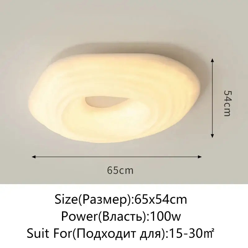 A modern cream cloud led ceiling chandelier with a smooth off-white donut shape 65x54cm for living room decorbites cloud led
