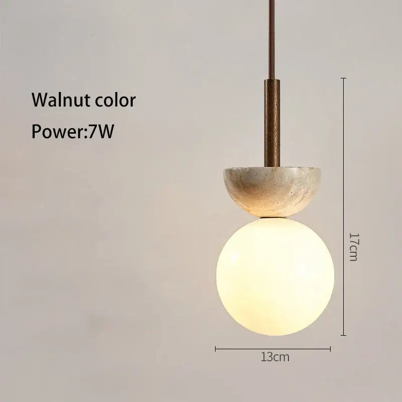 Walnut-colored pendant lamp with matte upper dome and frosted glass sphere by decorbites cream style led for bedroom use