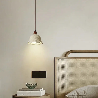 Modern cream textured ceramic pendant lamp with fluted edge and dark wood fixture from decorbites bud micro cement collection