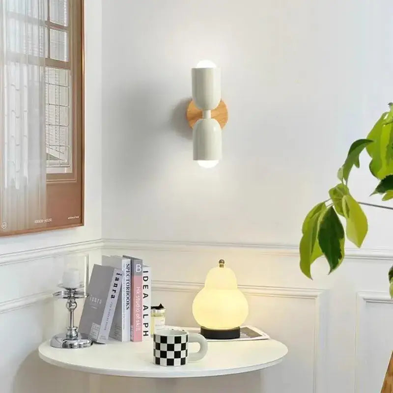 Modern cream zipper wooden wall lamp wall sconce with dual white heads and wooden circular base for bedroom illumination