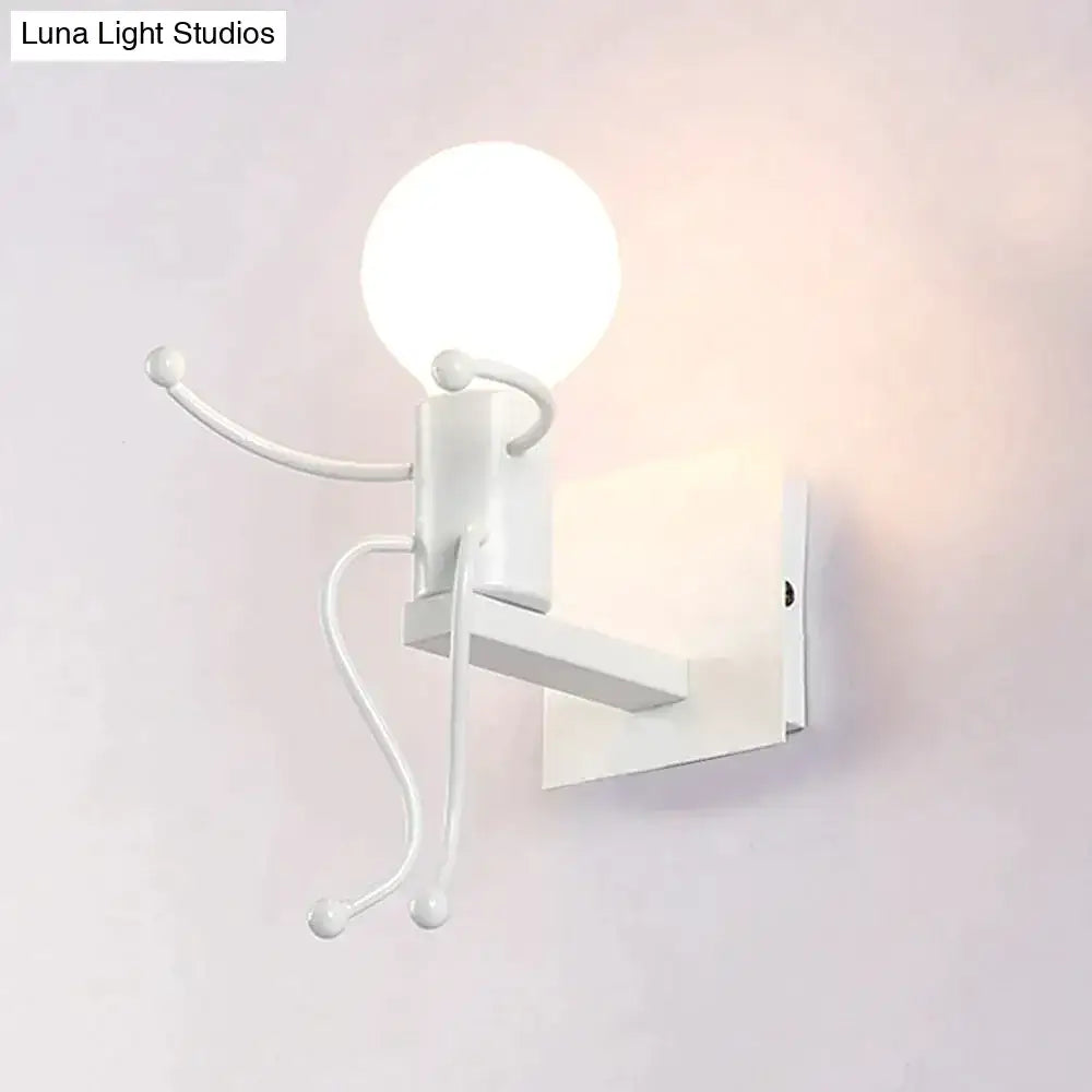Modern creative minimalism white metal wall sconce shaped like a robot ant with articulated limbs and spherical bulb head