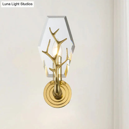 Modern style gold-toned direct wired electric sconce light with antler shape and hexagonal crystal diffuser for bedroom