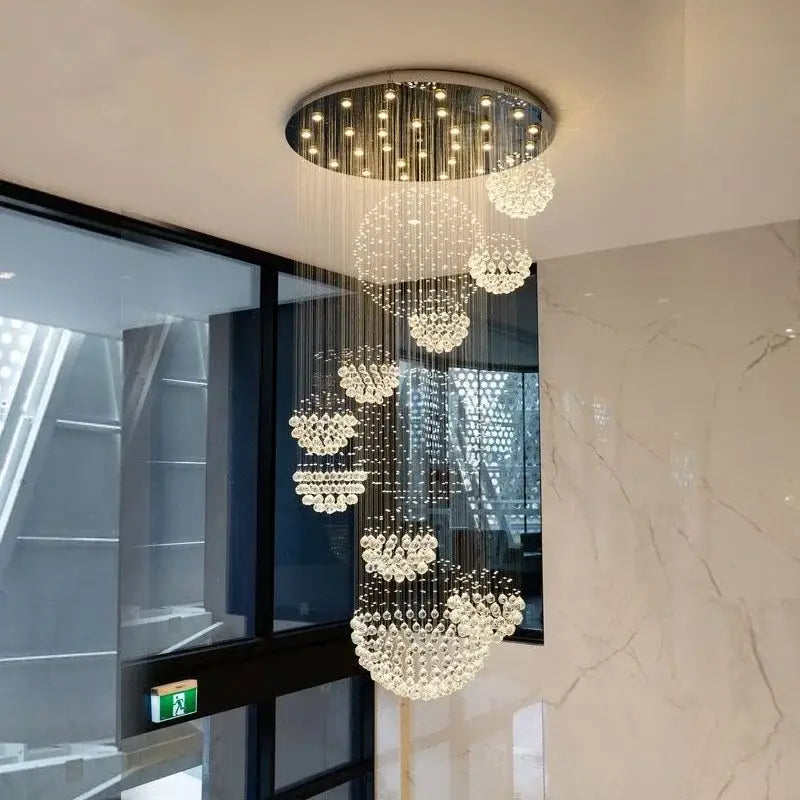 Modern crystal ball led chandelier with cascading clear glass orbs and chrome fixture for living room decorbites crystal ball