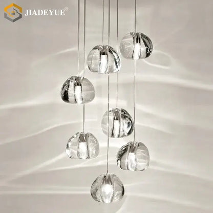 Modern crystal ball nordic led chandelier featuring clear crystal pendant lights with a cascading design for staircase decorbites crystal ball