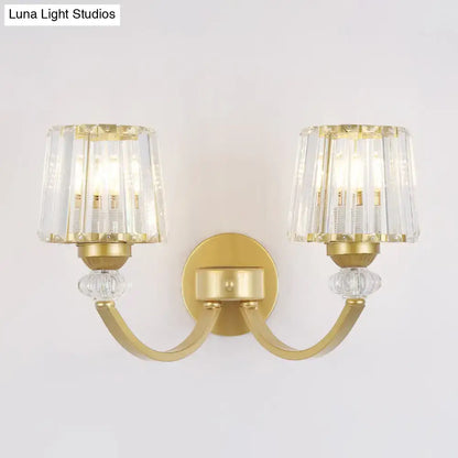 Gold-finished wall lamp with black gold curved arms and two crystal-encased light fixtures for modern bedroom lighting