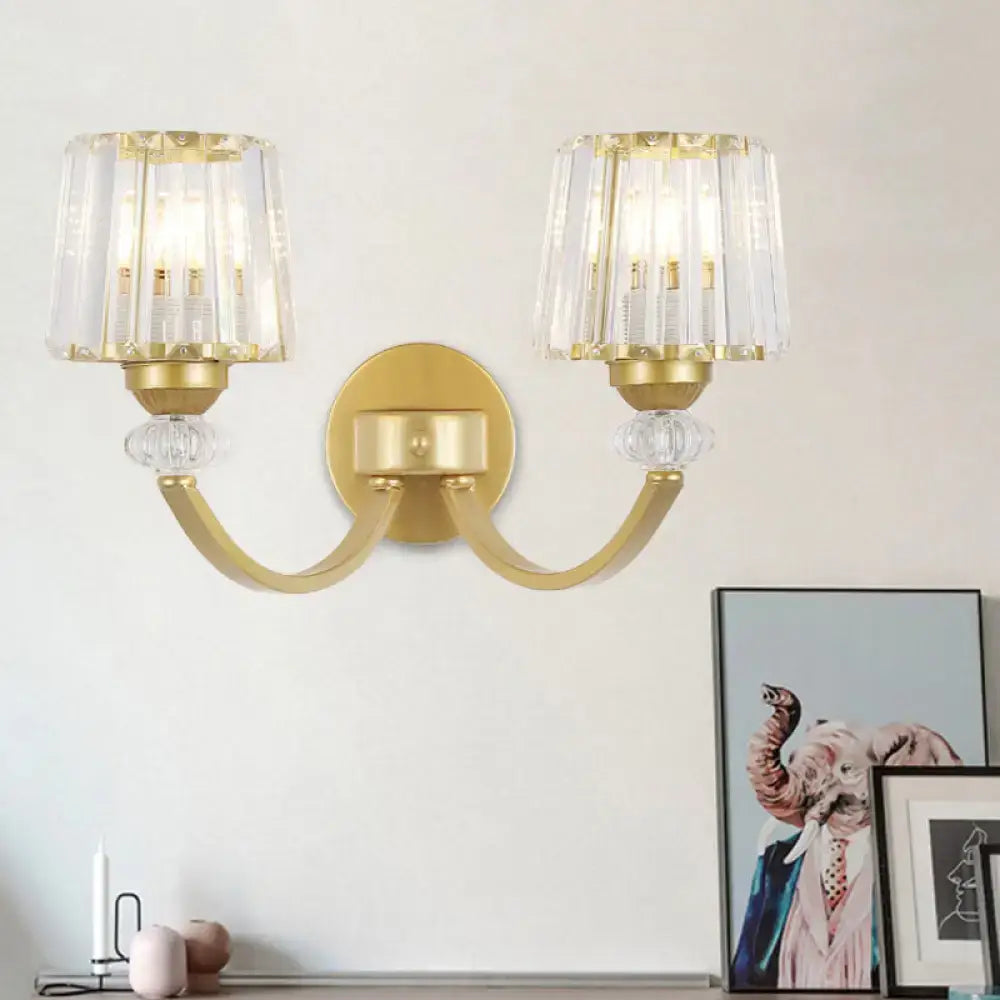 Modern crystal black gold wall lamp with gold-toned curved arms and two crystal-encased light fixtures for bedroom lighting