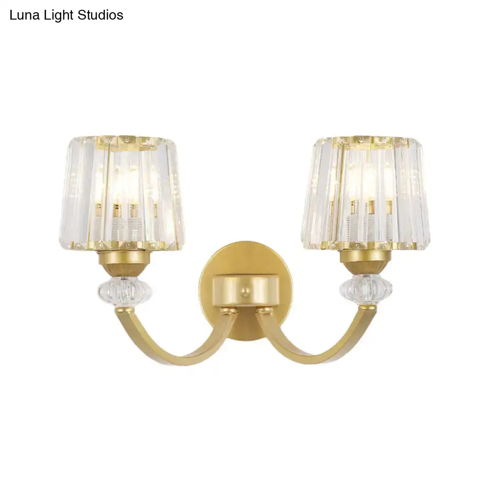 Gold-finished wall lamp with curved arm black gold design featuring two crystal-encased light fixtures and glass beads