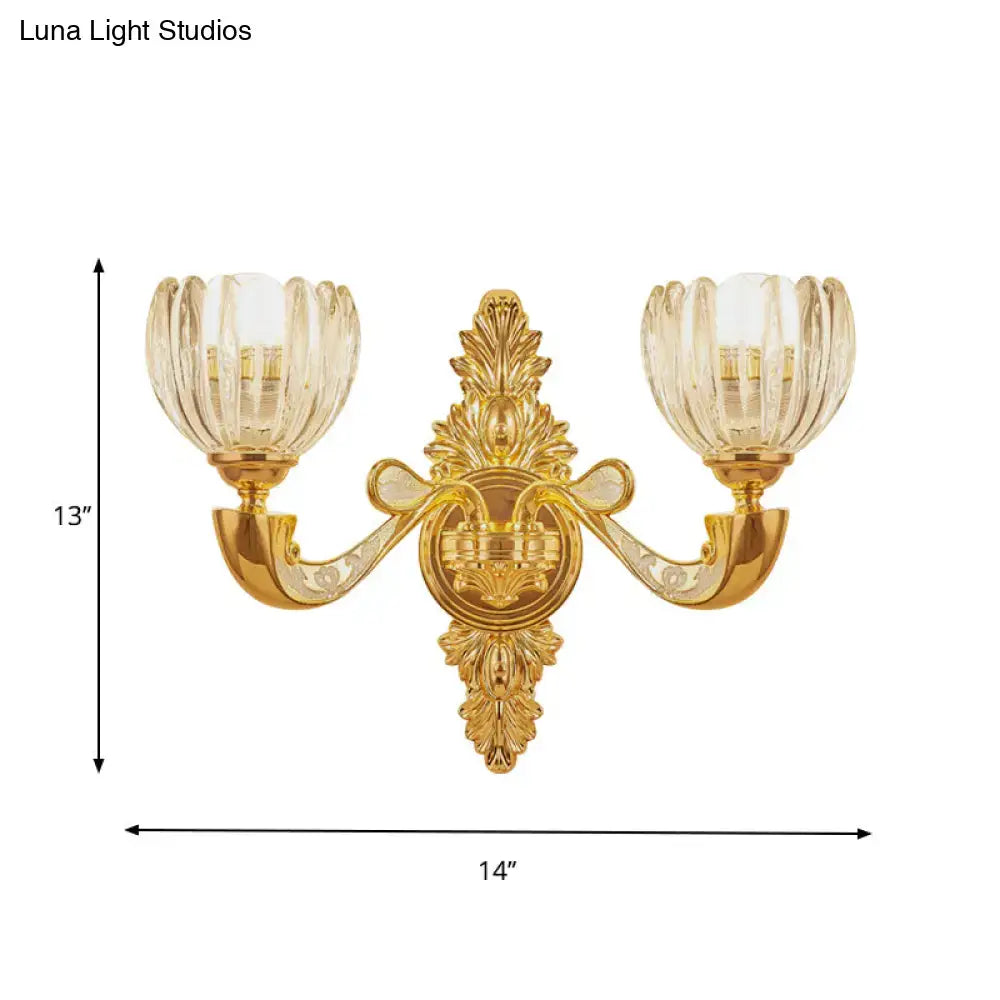 Gold-finished ornate block gold wall lamp fixture with two fluted glass shades for modern bedroom sconce lighting