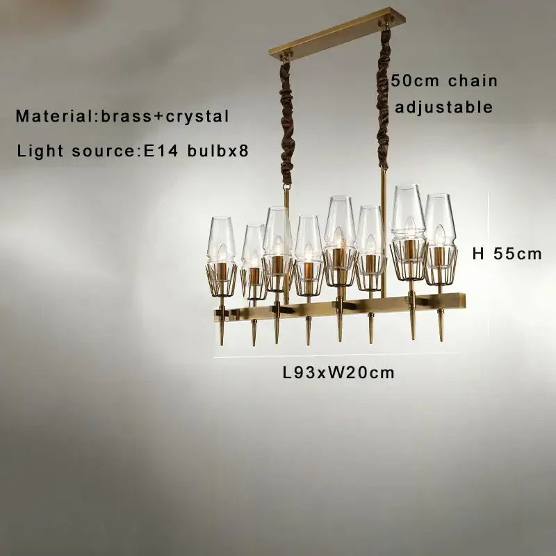 A modern crystal brass glass pendant light with clear shades and twisted chain suspension for dining room decorbites