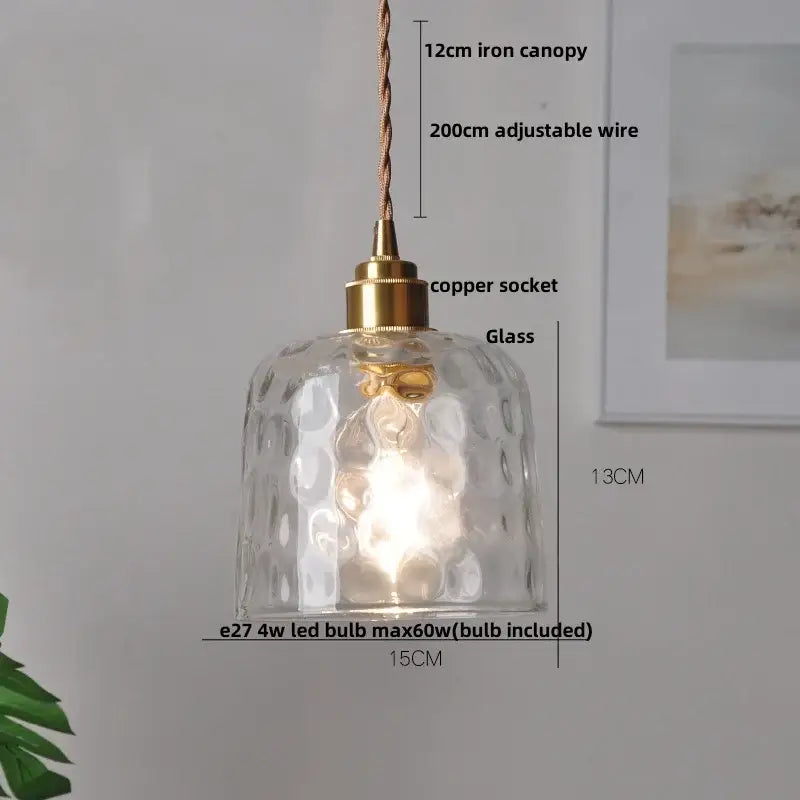 Clear glass pendant light with hammered texture and brass-colored copper socket for decorbites crystal brass led lighting
