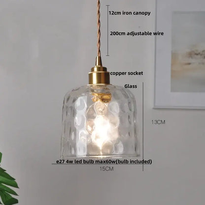 Clear glass pendant light with hammered texture and brass-colored copper socket for decorbites crystal brass led lighting