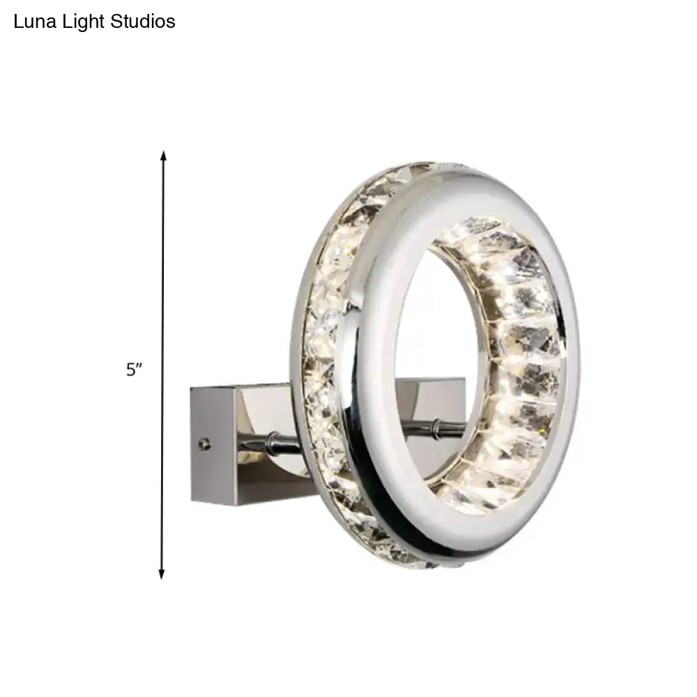 Modern crystal chrome sconce light fixture with clear faceted crystals and stainless steel shade for living room lighting