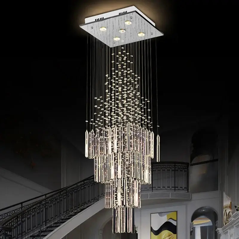 Modern crystal column chandelier with sleek silver mount and cascading clear faceted glass rods by decorbites crystal