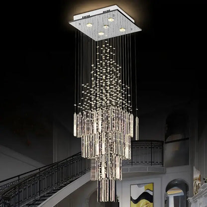 Modern crystal column chandelier with sleek silver mount and cascading clear faceted glass rods by decorbites crystal