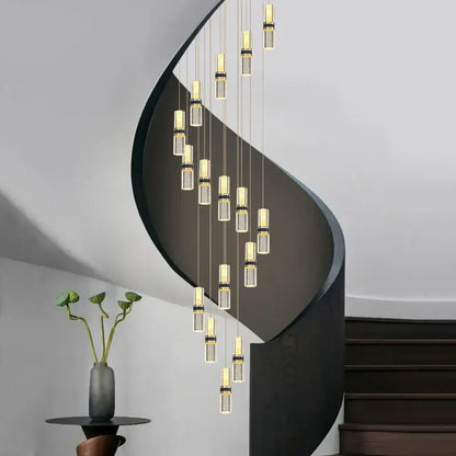 Modern spiral staircase with sleek black metal railings paired with decorbites crystal columnar chandelier stair lamp