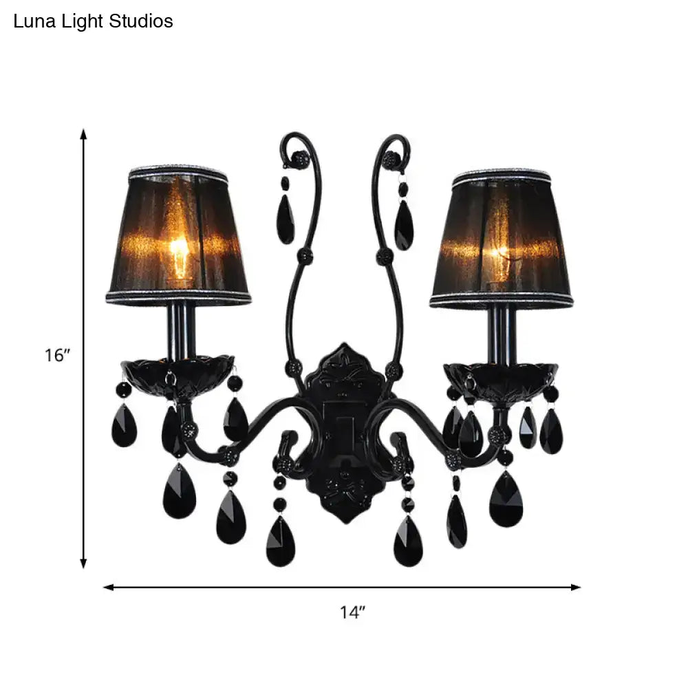 Elegant black wrought iron cone wall mount sconce with amber lampshades and teardrop crystal accents for living room