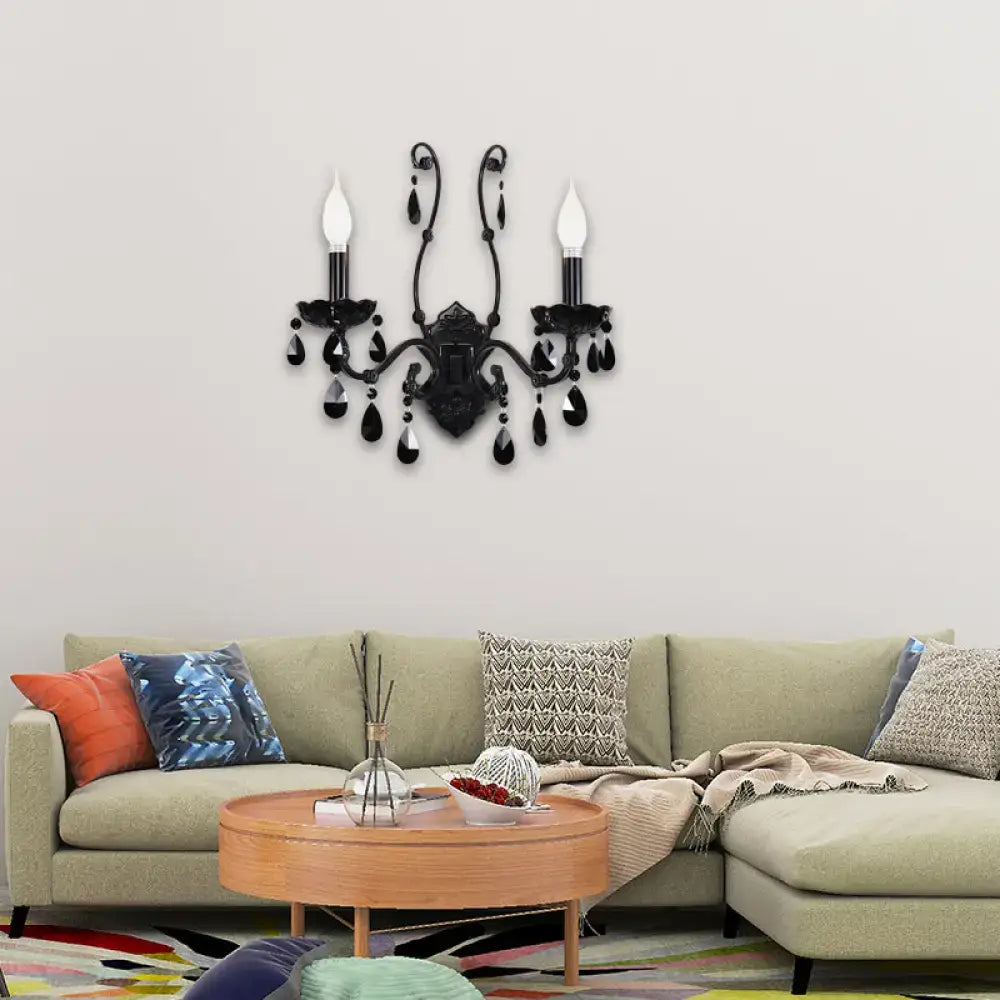 Modern black cone wall mount sconce with crystal droplets and candle-style bulbs for living room decor