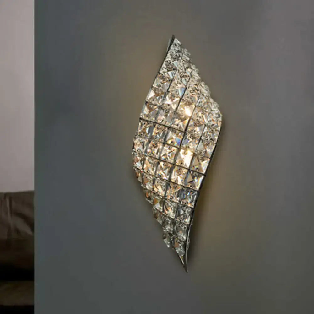 Modern crystal diamond wall mounted lamp with clear faceted crystals and polished silver frame for bedroom lighting
