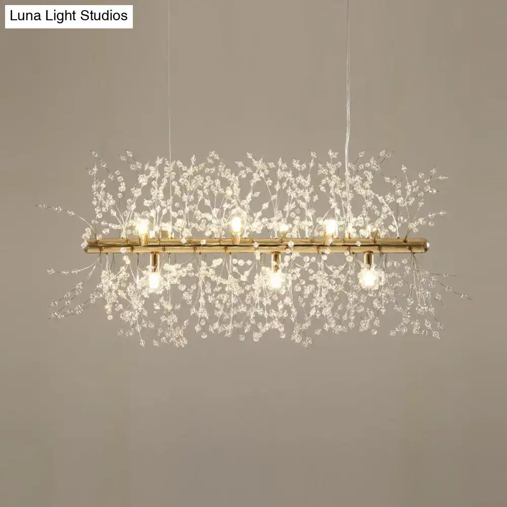 Elegant gold-toned DecorBites™ modern crystal flower island pendant ceiling lamp with delicate branches and warm bulbs