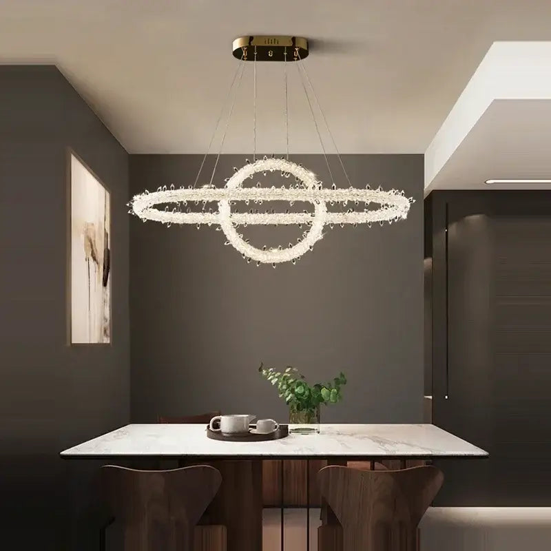 Modern crystal flower led chandelier with interlocking crystal rings and gold-toned fixture for dining room decorbites crystal flower