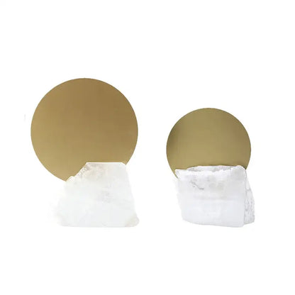 Modern crystal geometric metal sculpture bookends featuring white quartz crystal and gold-toned circular backplates for decorbites crystal geometric decor