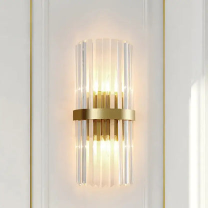 Modern crystal gold led wall sconce with vertical clear glass rods and central brass ring for elegant decorbites crystal gold lighting