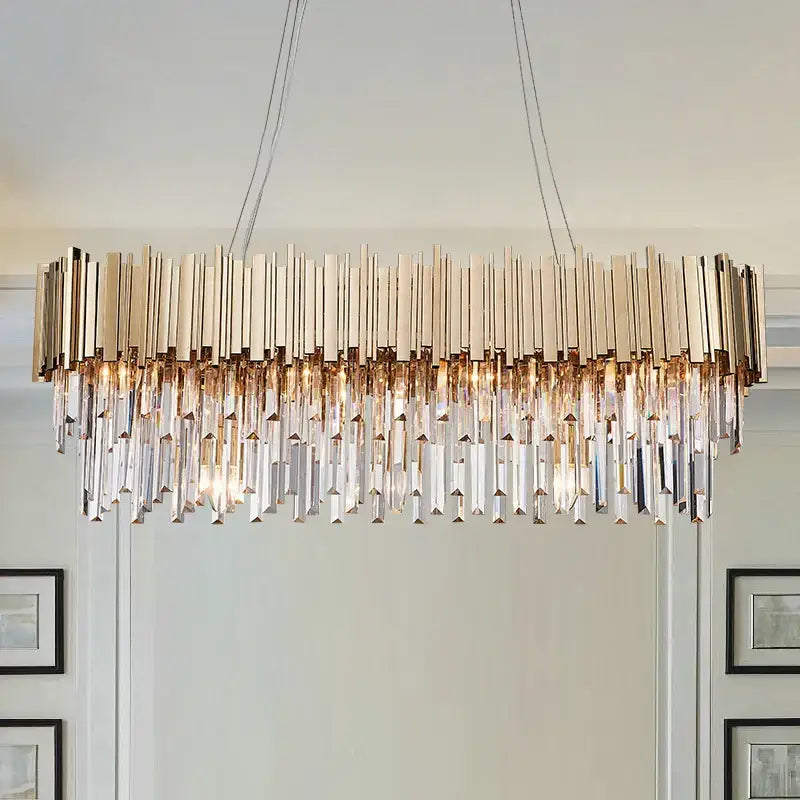 Modern pendant lights with decorbites gold metal frame and cascading clear crystal prisms for dining room decor