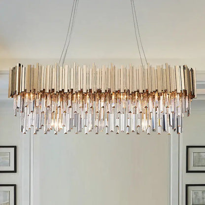 Modern pendant lights with decorbites gold metal frame and cascading clear crystal prisms for dining room decor