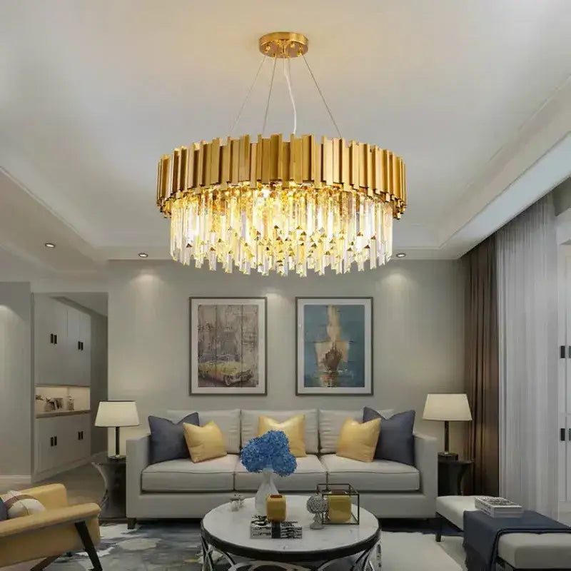 Modern crystal gold metal led pendant lights featuring gold-toned vertical slats and cascading crystal droplets for dining room decorbites gold metal