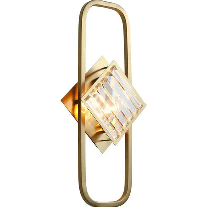 Modern crystal gold wall lamp with gold-toned geometric frame and faceted glass shade for bedroom decorbites crystal gold decor