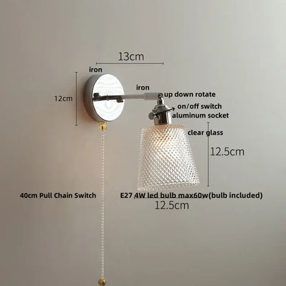 Modern crystal iron led wall light with adjustable polished iron base and diamond-cut clear glass shade for bedroom decorbites
