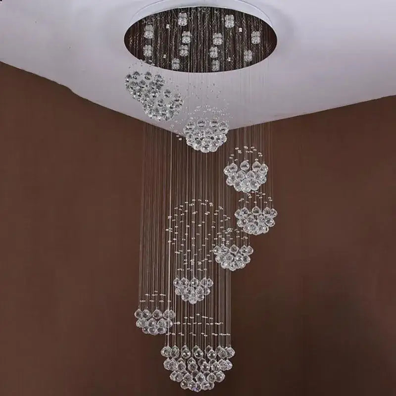 A modern decorbites crystal led chandelier with cascading clear glass beads for large villa kitchen ceiling light