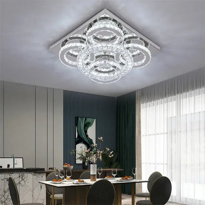 A modern crystal led square chandelier with concentric rings and chrome frame for living room decorbites crystal led