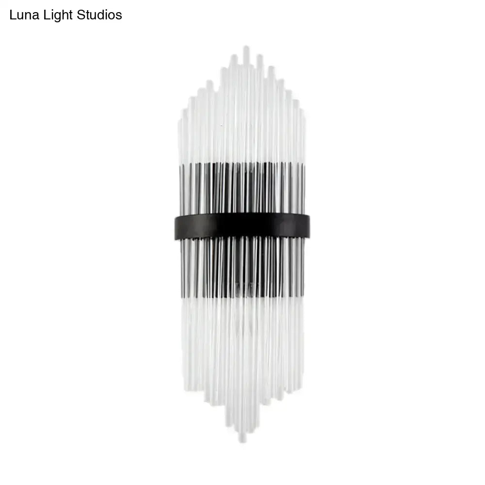 Modern crystal prism wall sconce with clear glass tubes and a black metal square backplate for living room lighting