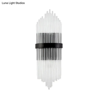 Modern crystal prism wall sconce with clear glass tubes and a black metal square backplate for living room lighting