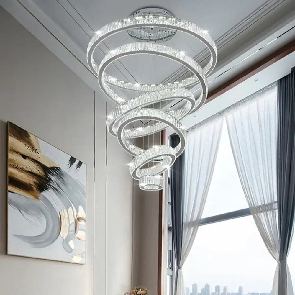 Modern crystal ring led chandelier with clear crystal accents and metallic frame for staircase or dining room decorbites crystal ring