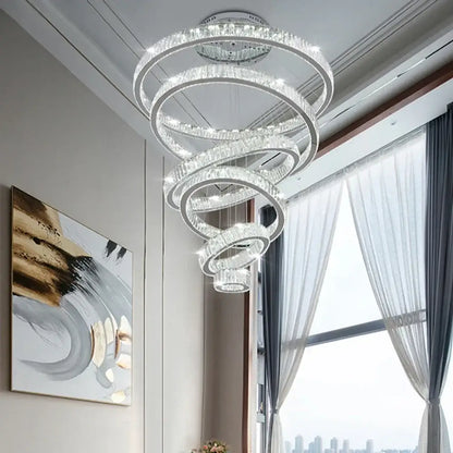 Modern crystal ring led chandelier with clear crystal accents and metallic frame for staircase or dining room decorbites crystal ring