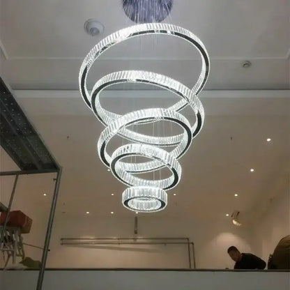 Modern crystal ring led chandelier with concentric clear crystal rings and embedded leds for staircase or dining room decorbites crystal ring