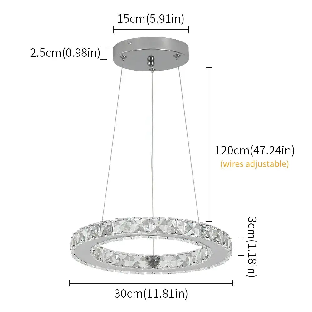 A modern chrome pendant light featuring decorbites crystal rings led with clear faceted crystal accents for dining room decor