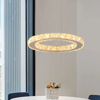 Modern crystal rings led pendant light featuring double-ring faceted crystal elements with warm lighting decorbites crystal rings