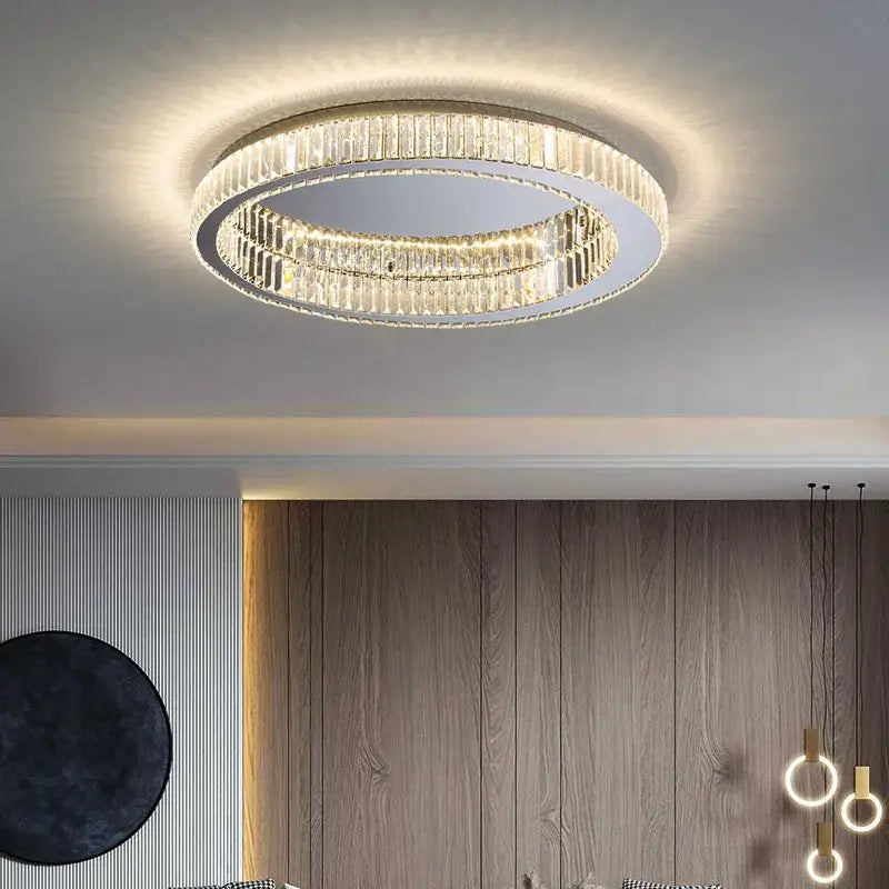 Modern crystal round ceiling lamp with two concentric rings of clear faceted crystals in a sleek metallic frame