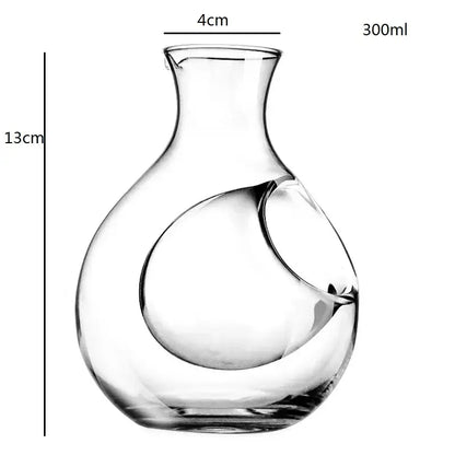 Modern crystal sake ice jug in clear glass with integrated circular handle and sleek design for decorbites crystal sake