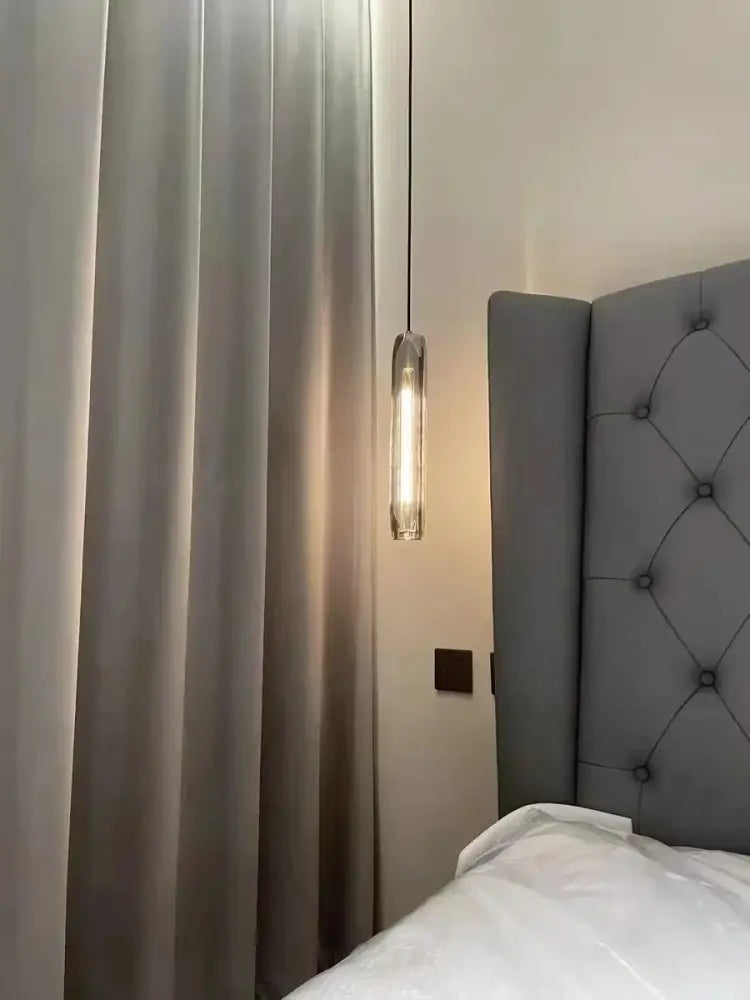 Modern crystal tulip chandelier bedroom glass pendant light with a clear body and warm glowing filament by decorbites crystal