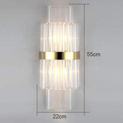 Modern crystal wall lamp featuring a clear glass tube with a gold accent band for elegant living room decorbites crystal wall lamp