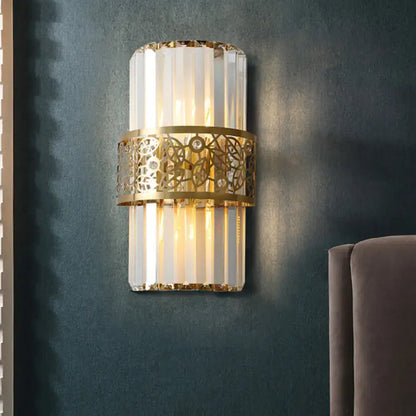 Gold-toned modern crystal wall light with vertical prisms and filigree band ideal as a study room wall lamp 220v-240v 110v-120v